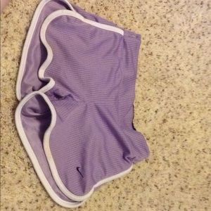 Purple Nike shorts